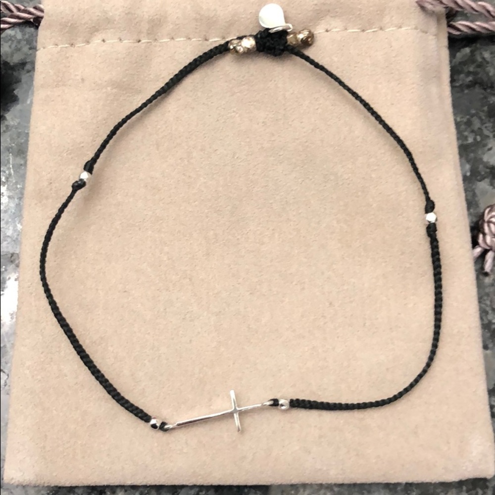 Tai bracelet with cross